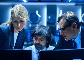Cybersecurity team reviewing threats to local government computer systems